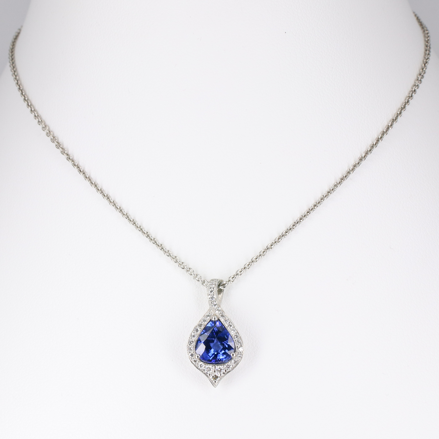 Platinum, pear-shaped sapphire and diamond atlantis pendant - Baroque ...