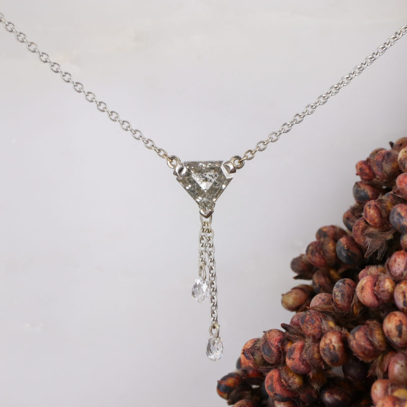 18ct white gold pendant with kite shape salt and pepper diamonds and white diamond briolette detail