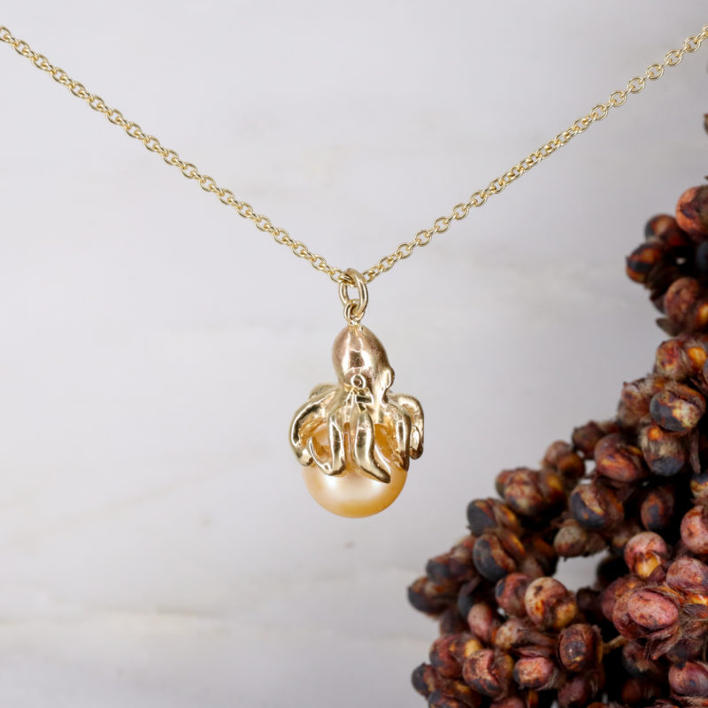 9ct yellow gold octopus pendant with golden pearl