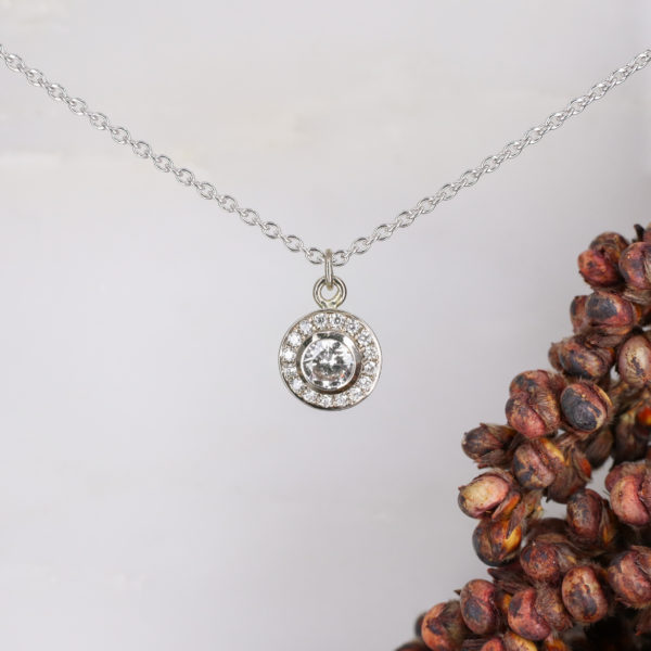 18ct white gold and white diamond molten filigree halo pendant
